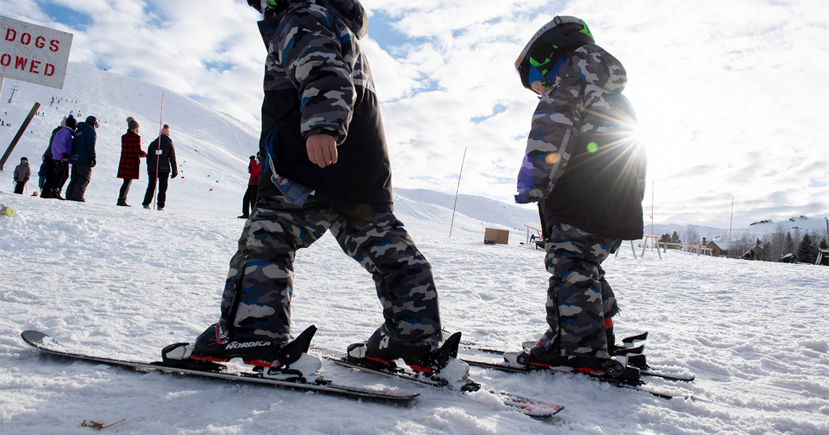 A Parent's Guide to Taking Kids Skiing and Snowboarding for the First Time
